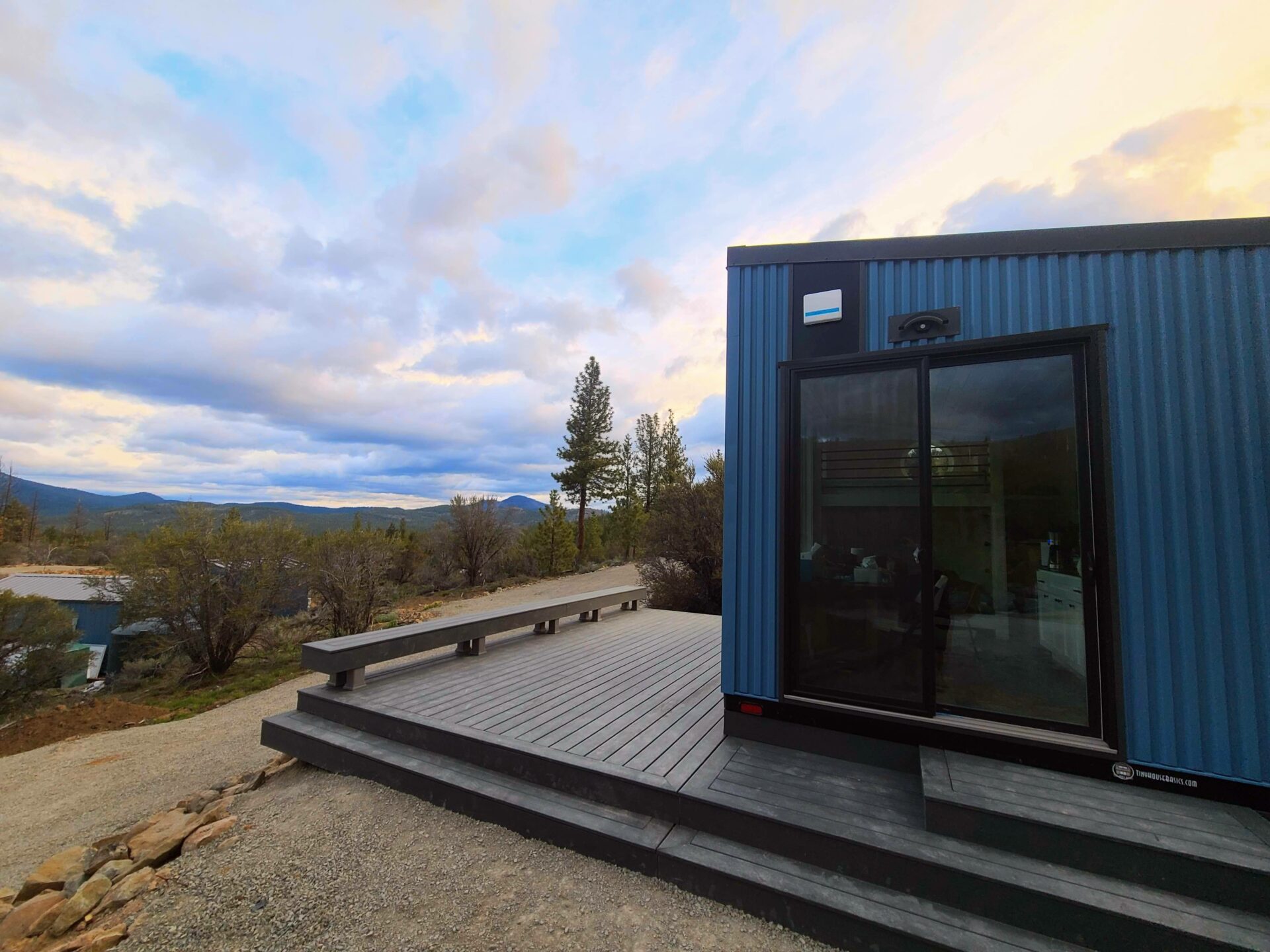North Cabin exterior with mountain backdrop